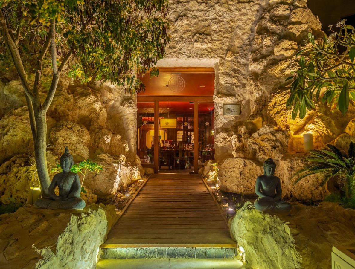 The Makadi Spa Hotel - Couples Only 18 Years Plus Hurghada Exterior photo Entrance to the restaurant